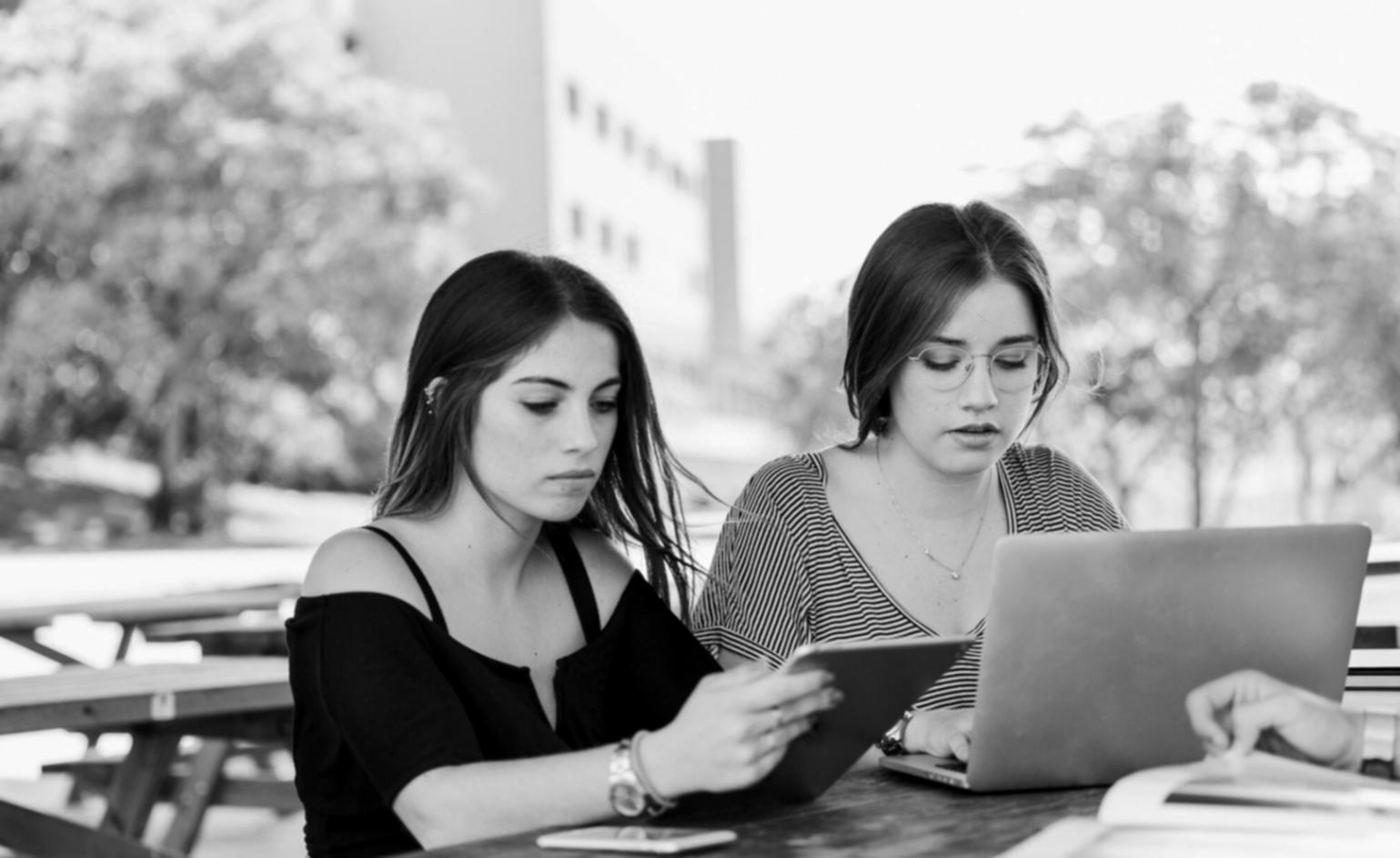Person reviewing financial statements on tablet