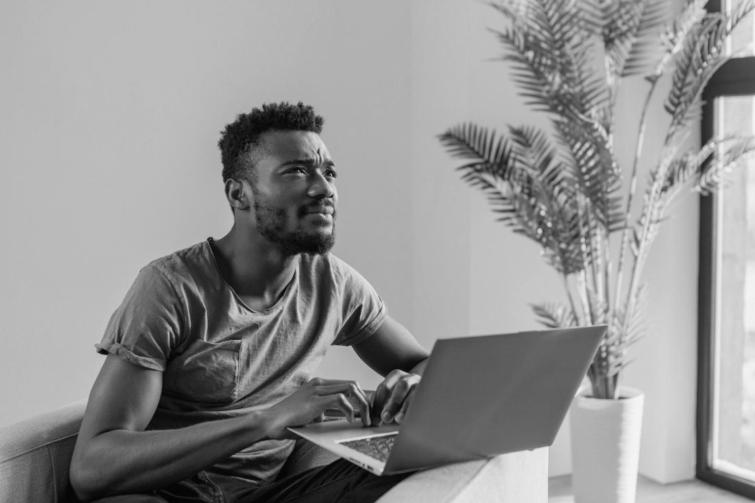 Professional analyzing financial data patterns on multiple screens